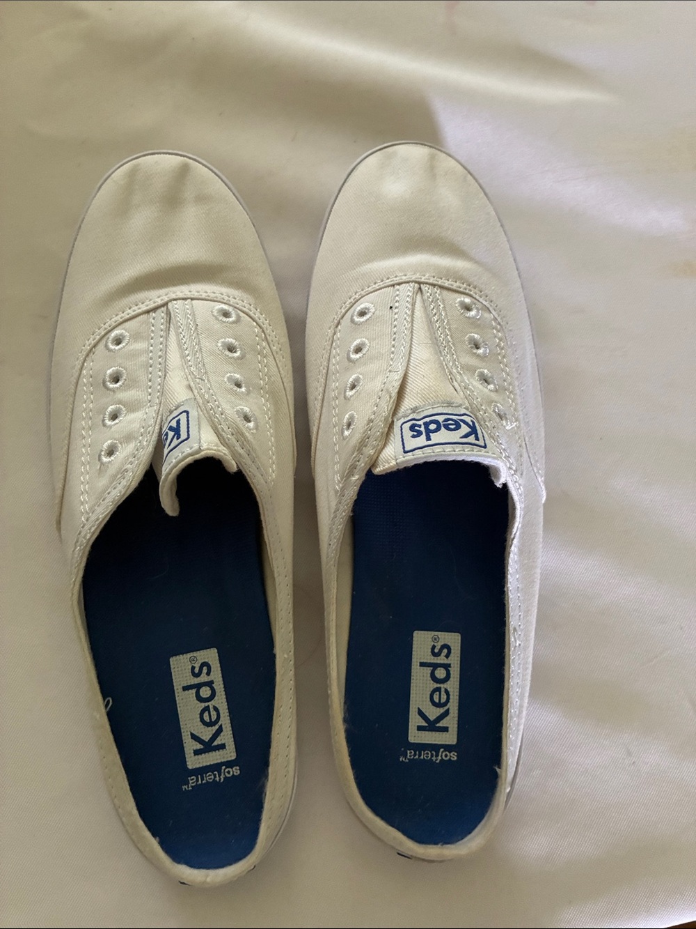 Keds White Canvas Slip-On Sneakers with Blue Insole